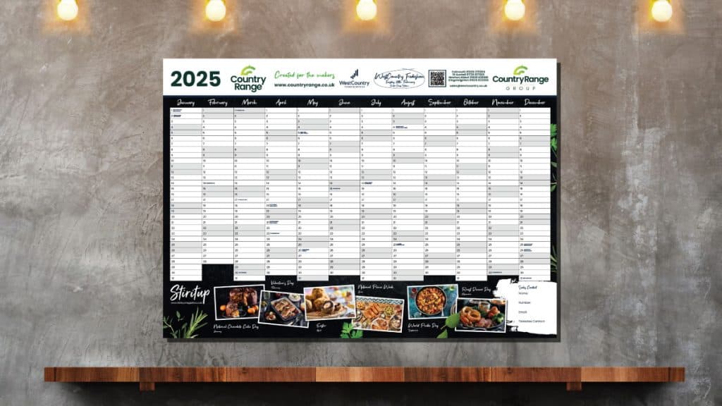 2025 Country Range wall planner calendar hanging above a shelf