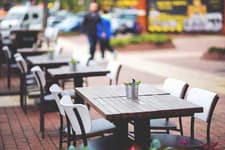 Outdoor terrace tables and chairs at a pub or café
