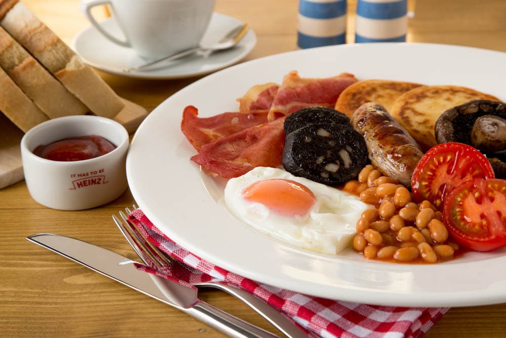 Full English breakfast with egg, bacon, sausage and beans