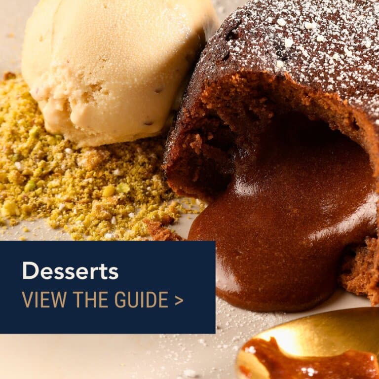 Desserts guide: chocolate fondant with ice cream and crushed pistachio